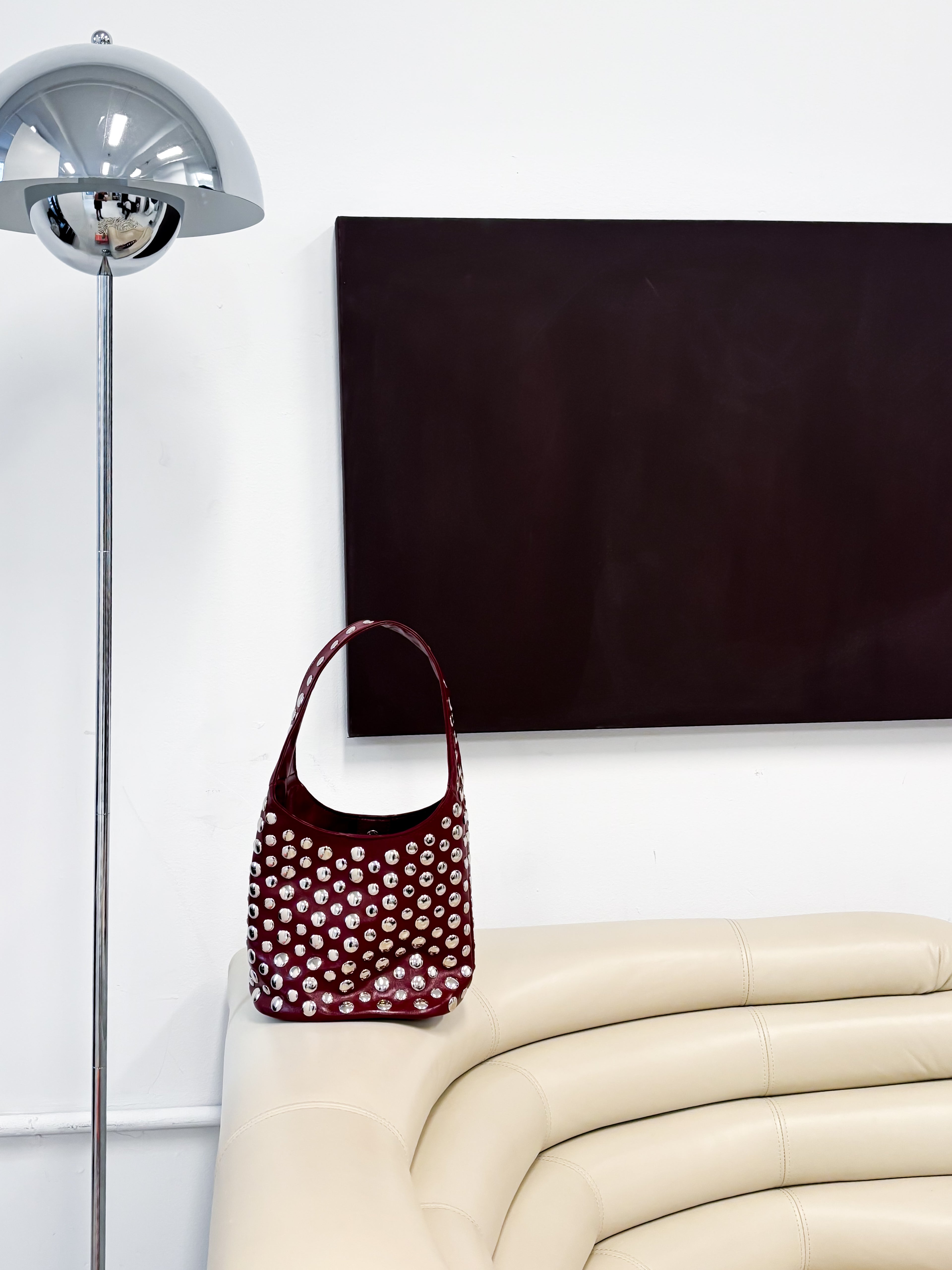 red studded handbag 